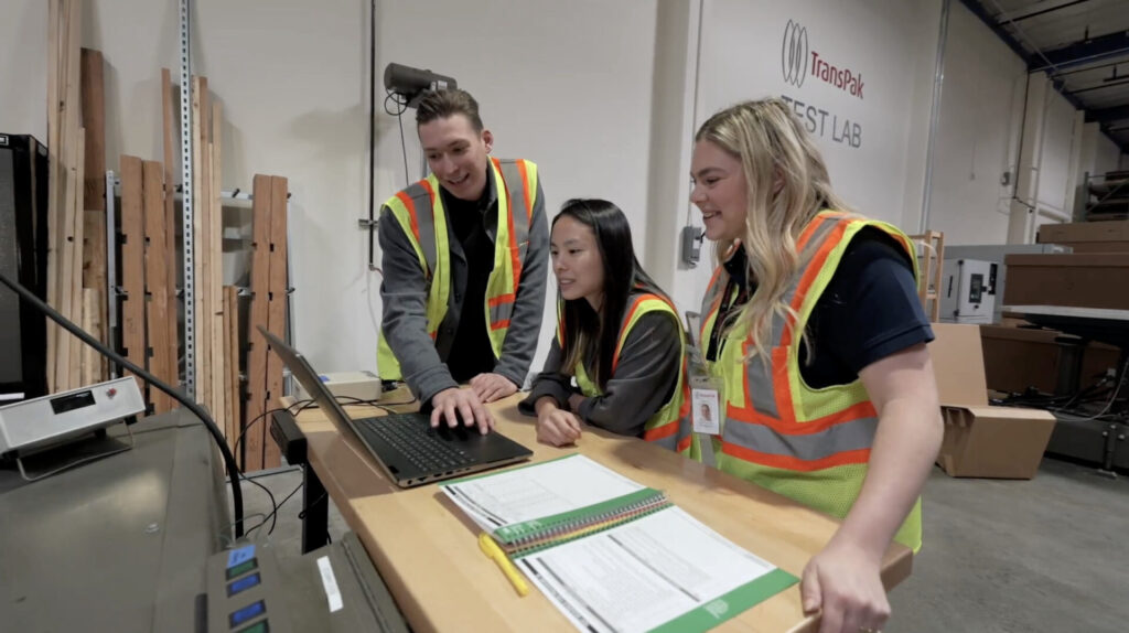 transpak team reviewing crate details on computer