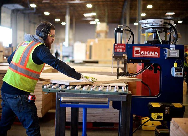 transpak worker assembling crates